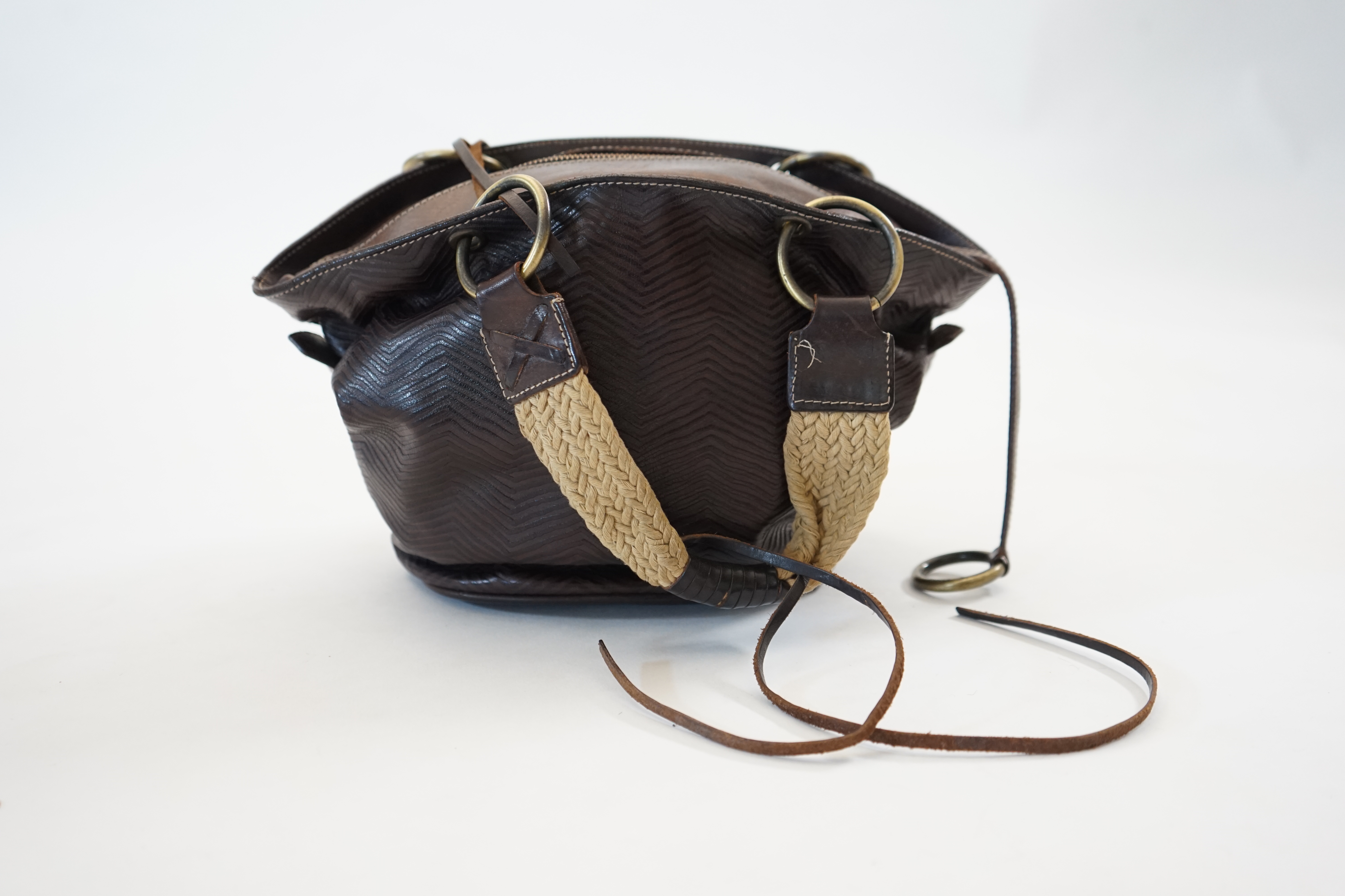 A Dolce & Gabbana brown and black leather bucket bag, width (max) 34cm, depth 14cm, height 20cm